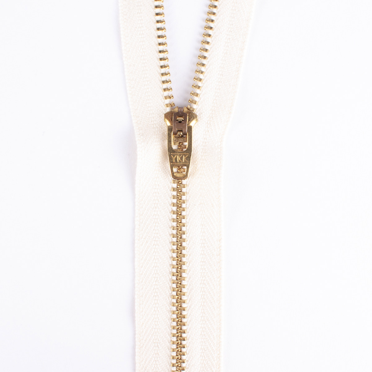 Brass zipper on organic cotton